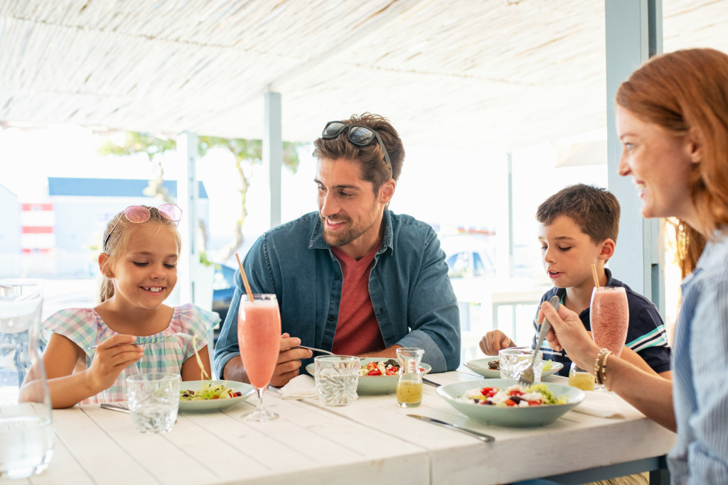 Family eating together in a restaurant.