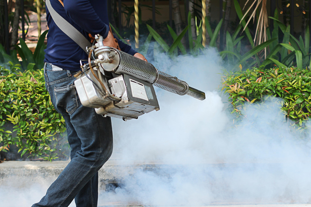 A man doing a fogging operation